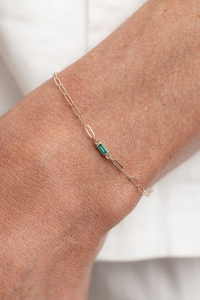 large link bracelet with emerald charm
