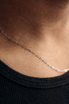 white gold large link necklace on man